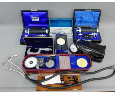 Carton containing miscellaneous scientific instruments to include a merger dial gauge and an auriscope etc., (a lot) 