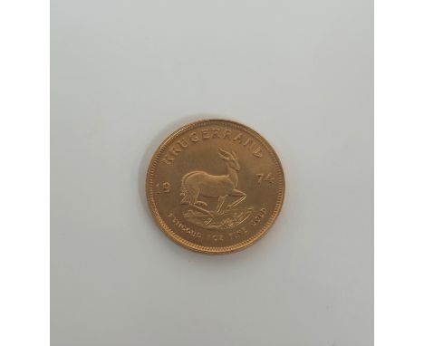 South Africa, 1974 gold full Krugerrand, obv; portrait of Stephanus Johannes Kruger, rev; springbok dividing date.