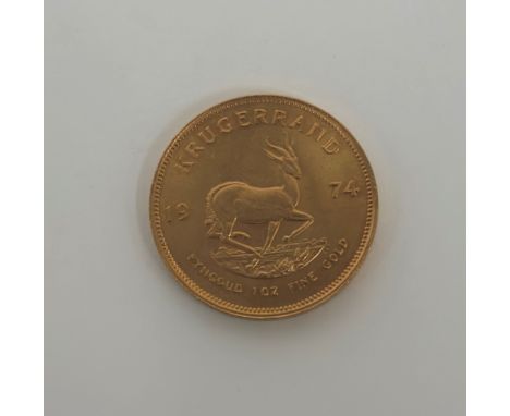 South Africa, 1974 gold full Krugerrand, obv; portrait of Stephanus Johannes Kruger, rev; springbok dividing date.
