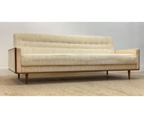 A Danish 1960's sofa/ daybed, upholstered in ivory white chenille type button back fabric, with squab cushions, teak show fra