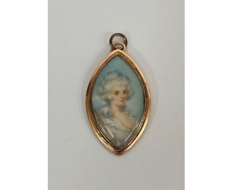 An English portrait miniature, c. 1790, of a lady with elaborately dressed hair, watercolour on ivory, mounted as a pendant i