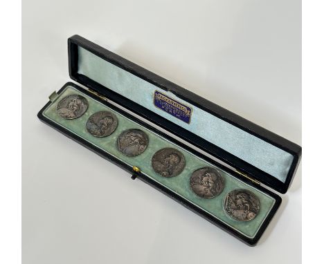 A cased set of six Edwardian silver buttons, Nathan &amp; Hayes, Chester, 1901, in the Art Nouveau taste, each circular butto