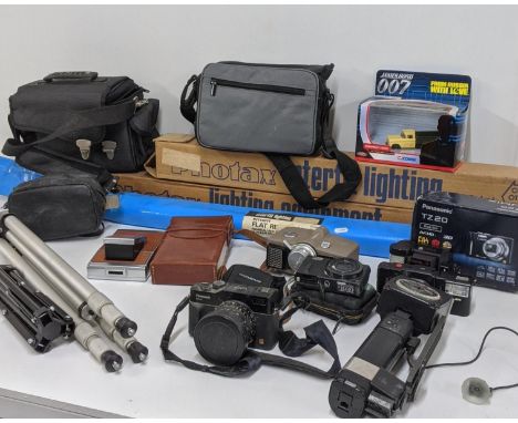 Mixed cameras and photograph equipment to include a Panasonic Lumix DMELC1 camera, tripods, Photax Interfit lighting and othe