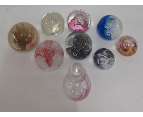 A group of 8 glass paperweights to include Caithness 'Tidal wave' together with a decorative glass scent bottle with stopperL
