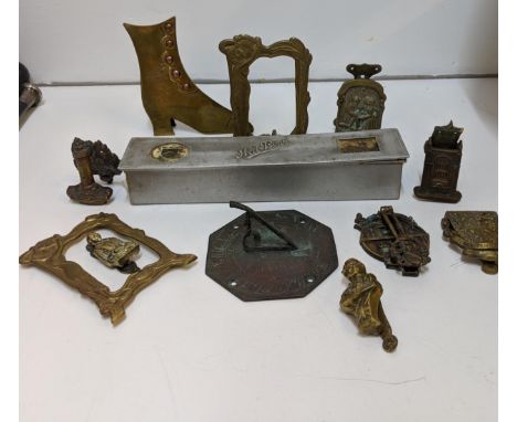 Brass in include small door knockers and sundial, two framed 19th century boot plaques and a hat pin, boxed, Location: 