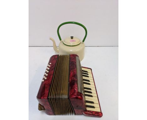 A mid century painted metal teapot and a Hohner piano accordion in a mottled red caseLocation:6.6 