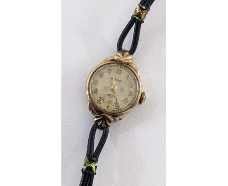 A vintage Rotary ladies 9ct gold manual wind wristwatch on a black leather strap Location: 