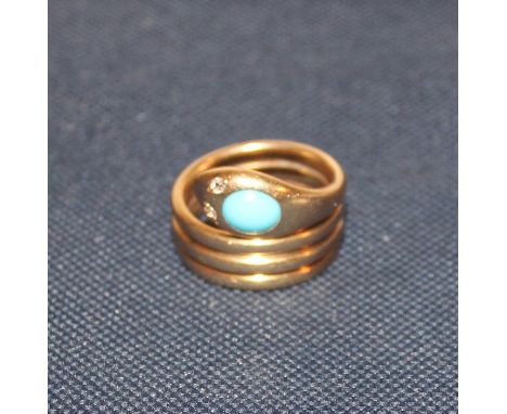 A Victorian 18ct. yellow gold "snake" ring, set oval cabochon turquoise to top of head and old-cut diamond eyes, hallmarked B