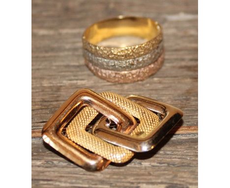 An 18ct. three colour gold triple band ring, having yellow, white and rose gold textured bands, together with an 18ct. three 