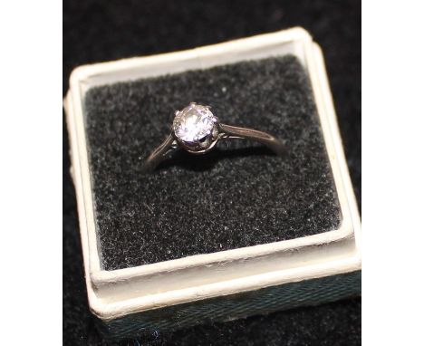 A precious white metal and solitaire diamond ring, claw set old round brilliant cut diamond, (diamond weight approx. 0.4 cara
