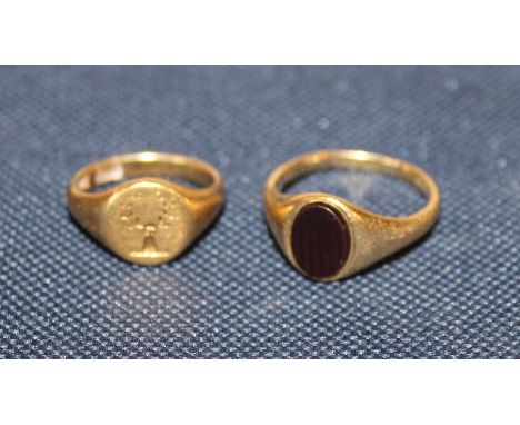 An 18ct. gold and black onyx signet ring, hallmarked to shank, (as found), (gross weight 5.5g), together with another 18ct. g