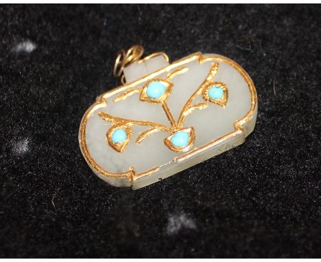 A Chinese carved mutton jade rectangular pendant,&nbsp;inlaid with precious yellow metal and set cabochon turquoise, the cent