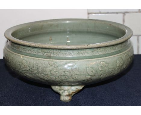 A Chinese Longquan celadon Censor raised on tripod Support, probably Ming dynasty, Firing fault to body