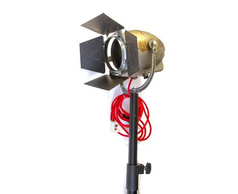 A Strand electric spotlight, on tripod stand  PLEASE NOTE ALL PROCEEDS FROM THIS LOT WILL GO TO SPORT RELIEF, THERE IS NO BUY