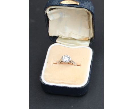 A precious white metal solitaire diamond ring, set round brilliant (approx. weight 0.75 carats), white metal assessed as 18ct