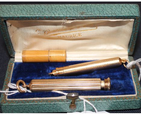 A Samson Mordan & Co. cased gold plated propelling pencil/dip pen set, comprising a ribbed propelling pencil/dip pen and a fr