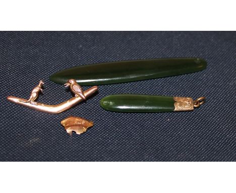 Two spinach jade pendants, lengths 83mm and 50mm, the smaller with engraved yellow metal pendant mount, together with a 9ct. 