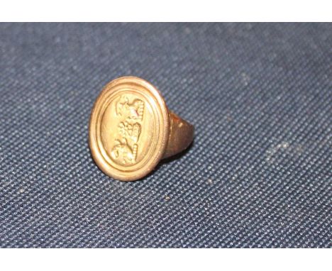 A yellow metal signet ring, unmarked, (yellow metal assessed as 9ct. gold). (9.6g).&nbsp;