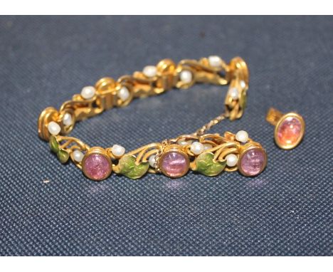 A precious yellow metal, enamel, blister pearl and cabochon pink stone bracelet,&nbsp; formed from a series of open work link