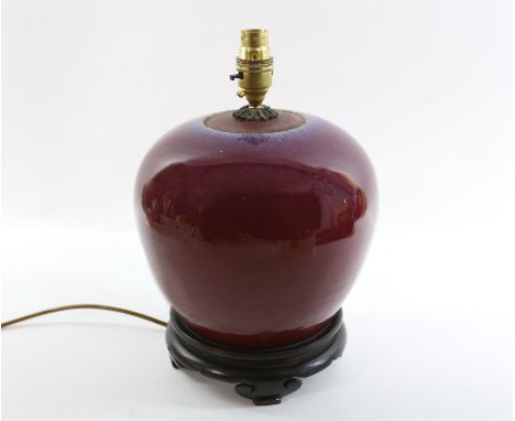 A Chinese Langyao oxblood jar mounted as lamp. Late Qing dynasty the ovoid jar with purple and blue accents at the upper rim 