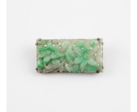 Chinese silver and jade brooch, Republic period, c1920. The Jade carved with a floral design. 4.1 X 2 cm