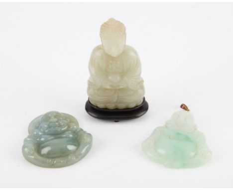 A collection of Chinese jades. To include a pale celadon jade carving of a seated buddha on lotus base. Together with a fitte