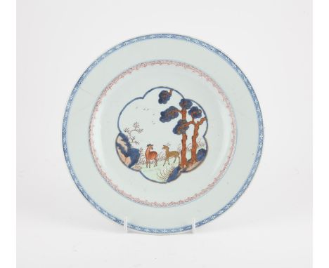 A Chinese Imari charger, Qing dynasty Kangxi period painted with landscape and deers . The charger has been broken and restau