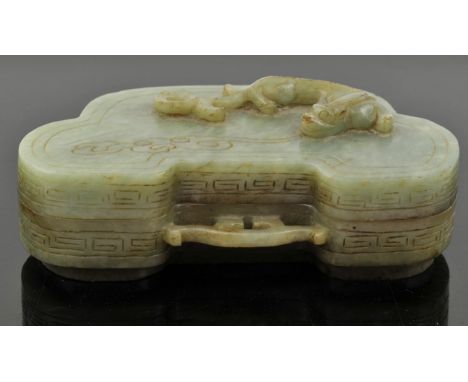 Chinese Ruyi shaped jade box. The cover carved with a beast and cloud. 17 cm wide