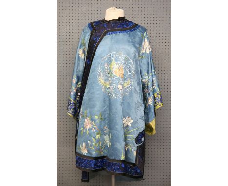 A Chinese Embroidered Blue Woman Jacket, Late Qing dynasty/Early Republic period. 92 cm LongCondition Report:  The outside of