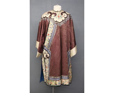 A Chinese Embroidered Purple Woman Jacket. Late Qing dynasty106 cm LongCondition Report:  The gown is in excellent condition 