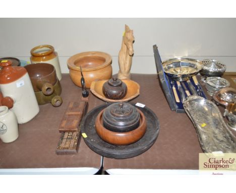 A quantity of various carved wooden items to include two cribbage boards