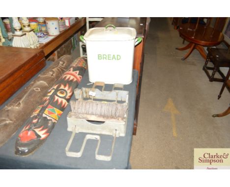 An enamel bread bin; and a boot scrap 