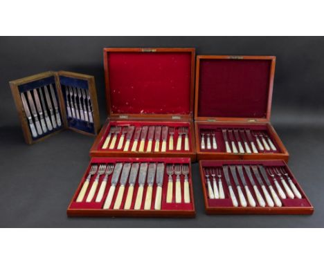 A mahogany cased set of 12 pairs of bone handled electroplate fish knives and forks, a cased pair of similar fish carvers, a 