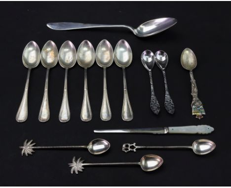 A silver tablespoon with pointed end handle, 21cm long, engraved with an initial 'A' below a crown, a set of six bead edge la