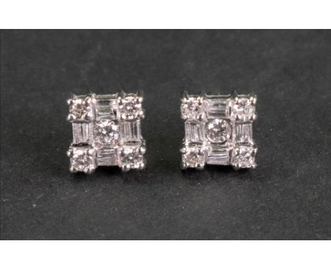 A pair of 18ct white gold and diamond set square cluster earstuds, each mounted with a circular cut diamond to the centre, in