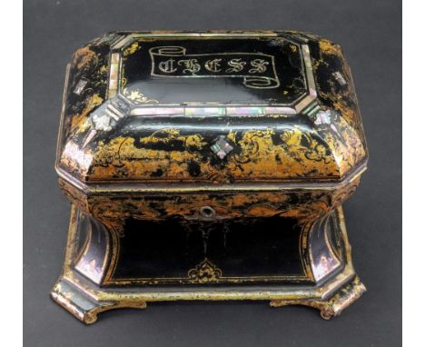 A Victorian papier mache chess box, stamped Jennens &amp; Bettridge, of sarcophagus form, gilt on a black ground and decorate