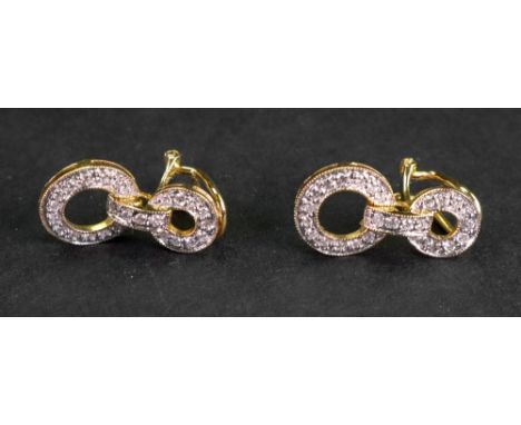 A pair of gold and diamond earrings, each formed as two circles with a diamond set central bar, mounted with circular cut dia