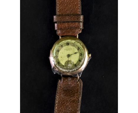 Waltham, USA; a 14ct gold wristwatch, the dial with Arabic numerals and subsidiary seconds dial, the automatic movement signe