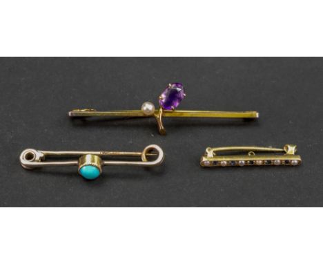 An early 20th century gold bar brooch with claw set amethyst and seed pearl 'fruit', a small bar brooch set with a central tu