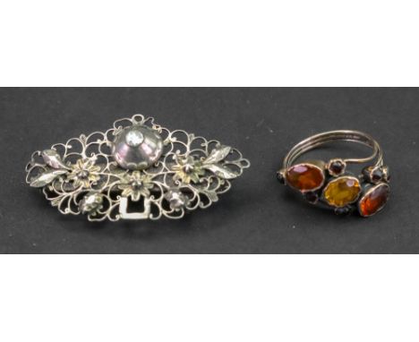 A 19th century dress ring, collet set oval cut orange and yellow topaz and garnets in open and closed back collet settings, r