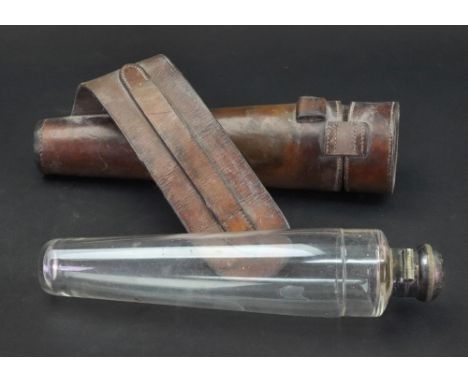 Two late Victorian electroplate mounted glass hunting flasks, of tapering circular section, one in original leather carrying 