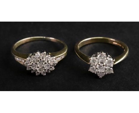 An 18ct gold and diamond cluster ring, the seven round cut diamonds claw set in white metal to a yellow band, ring size J ½; 