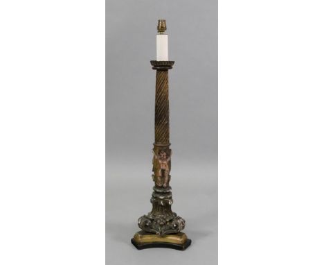 An Italian carved giltwood gesso and polychrome painted candlestick, 18th century, with a spiral lobed and fluted cylindrical