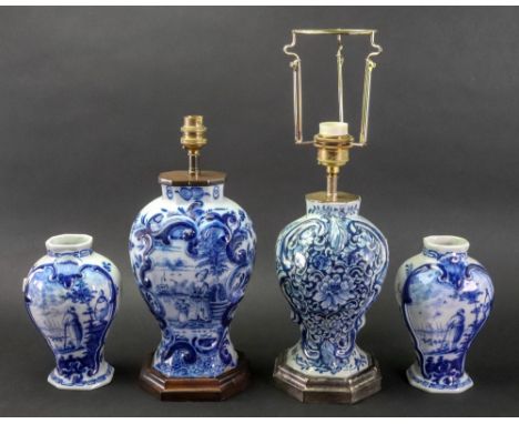 A group of Dutch Delft blue and white wares, 18th/19th century, comprising: two octagonal baluster vases adapted as lamps, on