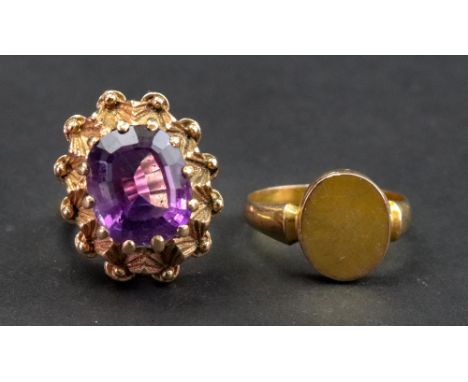 A 9ct gold amethyst set dress ring, S &amp; Co, Birmingham 1970, the oval claw set amethyst in a cast chevron mount, ring siz