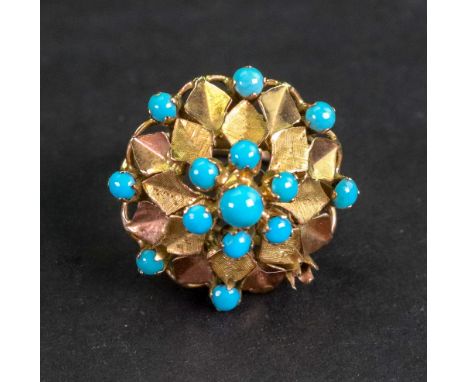 A gold and turquoise cluster ring, designed as a stylized flowerhead, with a scroll pierced underside, ring size M ½, 7.2g gr