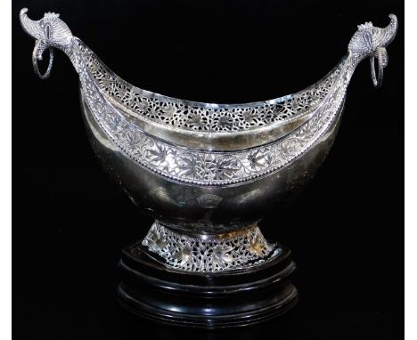 An early 20thC Indian ceremonial bowl, of shaped ellipse form with heavily cast ring handles, and a pierced border set with f