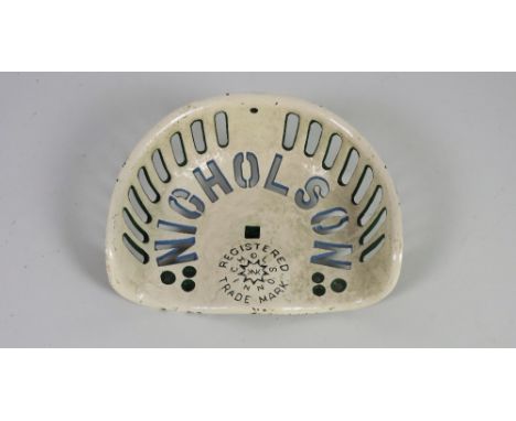 A "Nicholson - Trademark" Tractor Seat, painted white, green, and blue, C.N. 1206, FR 757, Rate 6, CB 45.9, Rate 9. (1)
