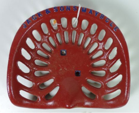 A "Jack & Sons, Maybole," Tractor Seat, painted red and blue (two square holes). G.B. 33, 5, Rate 8; FR 563, Rate 6. (1)