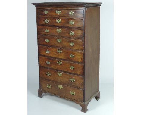 An early George III period Irish mahogany Tallboy, the moulded top over eight finely figured graduating drawers, each with or
